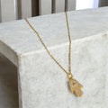1. Serene Hamsa Necklace